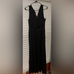 New from Torrid black romper v-neck sleeveless pant style size  M/L